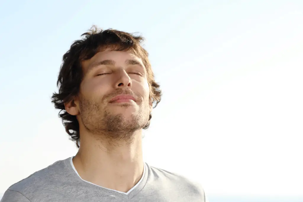 man breathing in